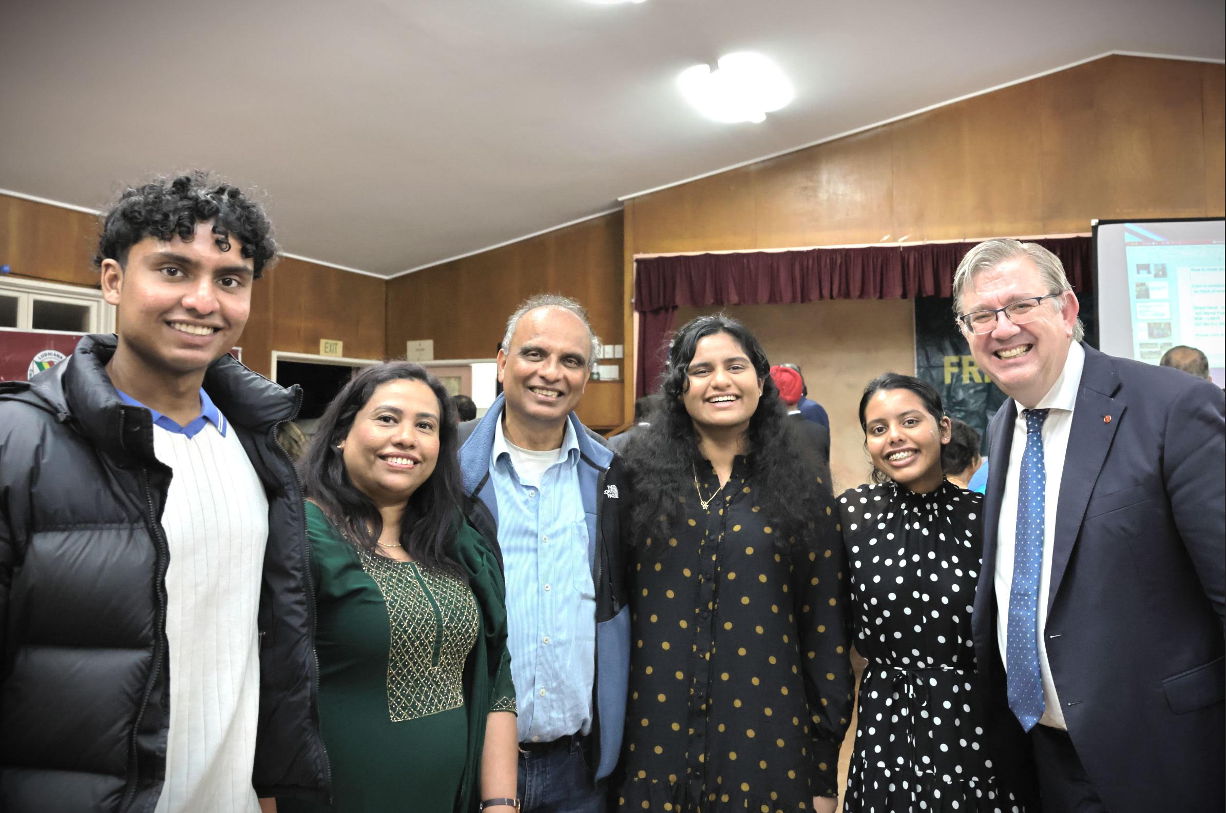 Guests with the visiting guest speaker at the gathering