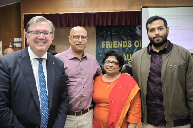 Guests photographed in front of the Friends of Ludhiana Australia banner
