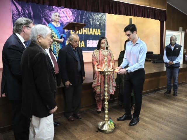 Attendees watching the lamp lighting ceremony